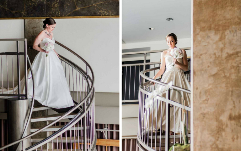 Proximity Hotel Wedding - Sarah and Catherine on staircase