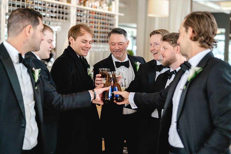 A Toast | Photo by Griffin Hart Davis Photography The Groom and groomsmen toast in celebration of the upcoming wedding.