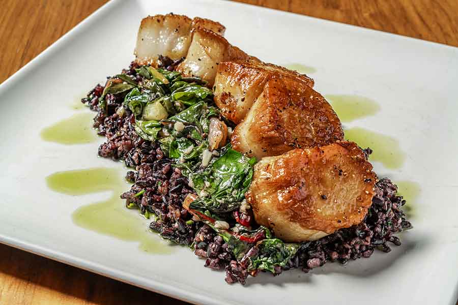  Pan-Seared Scallops, forbidden black rice, Swiss chard, charred scallion oil
